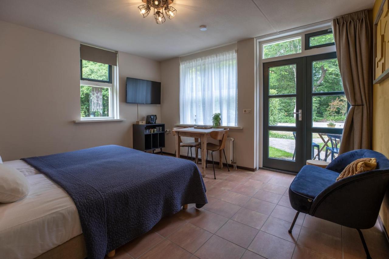 Bed & Bos De 14 Sterren Hotel Den Burg Bagian luar foto