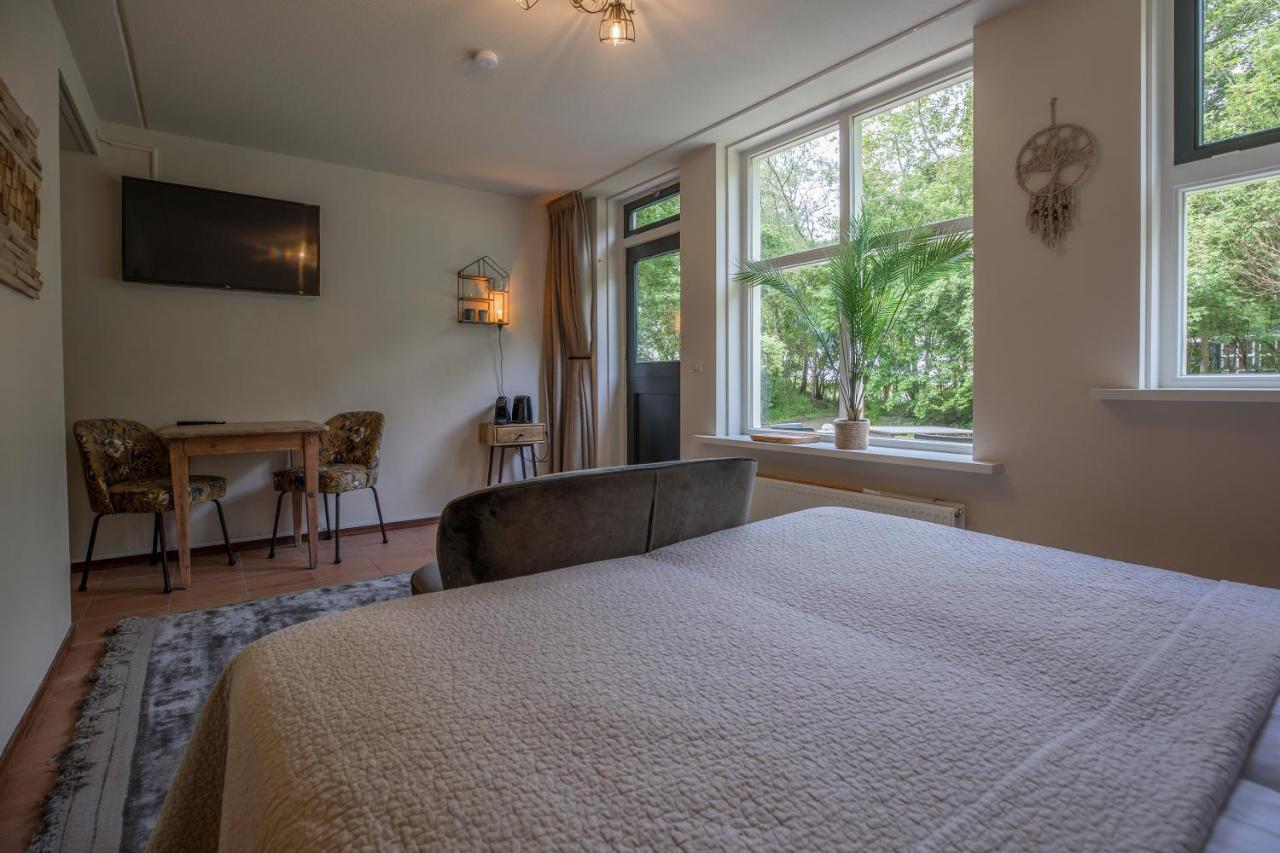 Bed & Bos De 14 Sterren Hotel Den Burg Bagian luar foto
