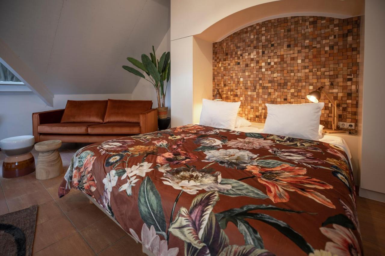 Bed & Bos De 14 Sterren Hotel Den Burg Bagian luar foto