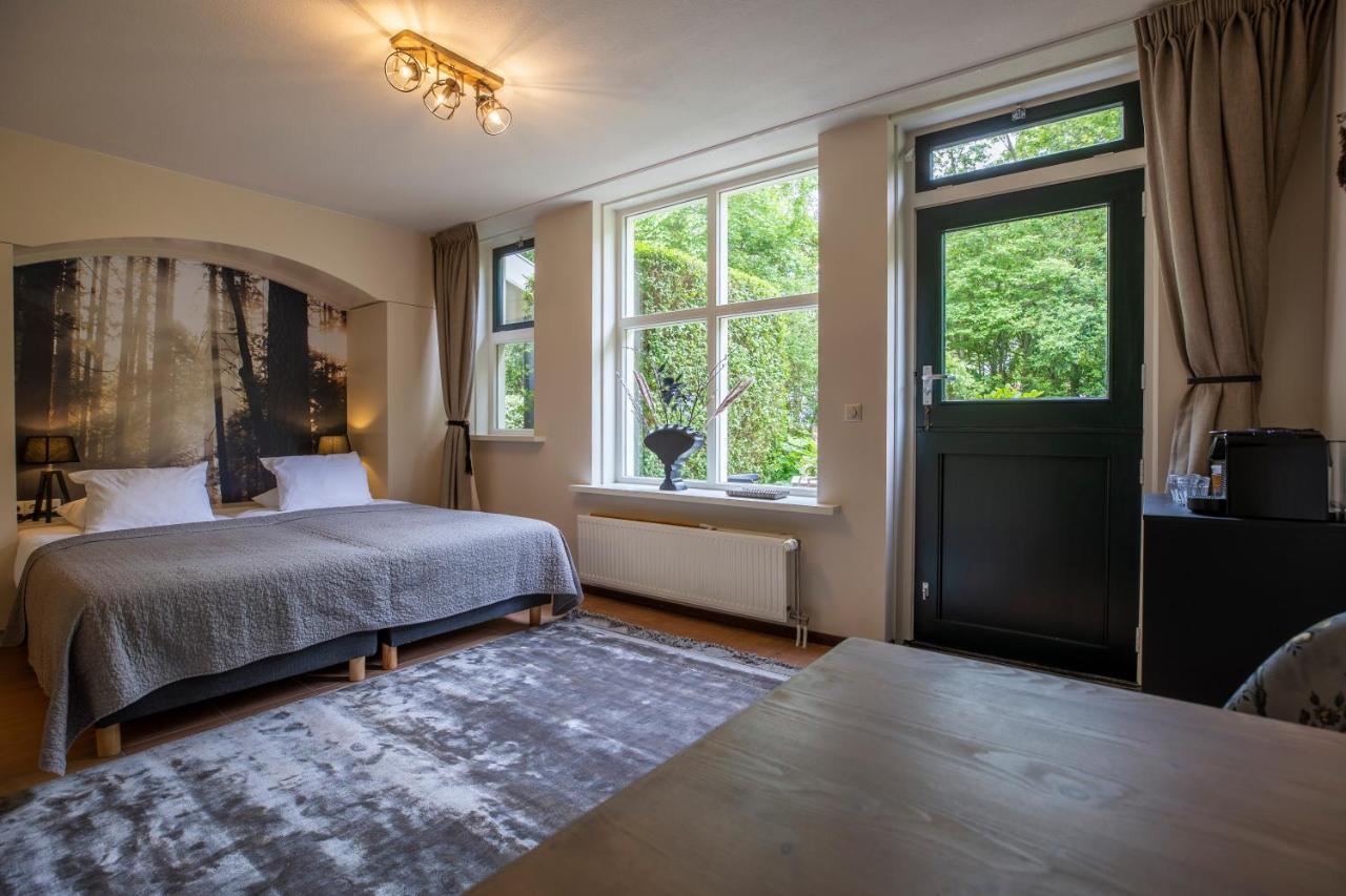 Bed & Bos De 14 Sterren Hotel Den Burg Bagian luar foto